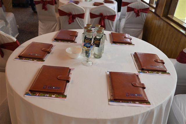 Round table set with branded diaries and delegate kits