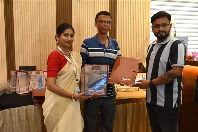 Delegate receiving a gift during felicitation
